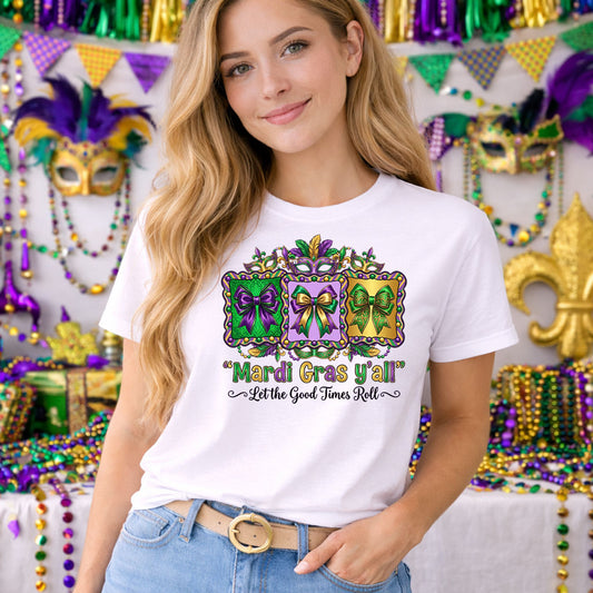 Let The Good Times Roll Mardi Gras Y'all DTF transfer design mockup on a t-shirt featuring multicolor collage MARDI GRAS Y'ALL lettering with Let The Good Times Roll subtitle