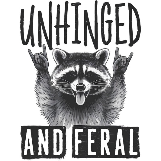 Unhinged And Feral Raccoon DTF transfer design featuring a cartoon raccoon making rock and roll hand signs with the bold all-caps phrase Unhinged And Feral above and below