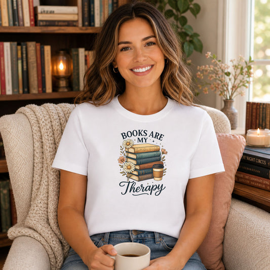 Books Are My Therapy DTF transfer design mockup on a t-shirt featuring a stack of vintage books topped with daisies and a coffee cup with Books Are My Therapy script