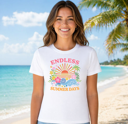 Endless Summer Days DTF transfer design mockup on a t-shirt featuring a sunset with palm trees, waves, hibiscus flowers and Endless Summer Days typography