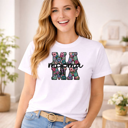 Faux Yarn Mama Floral Black DTF transfer design mockup on a t-shirt featuring MAMA letters in embroidered floral patterns on black yarn with cursive mama script