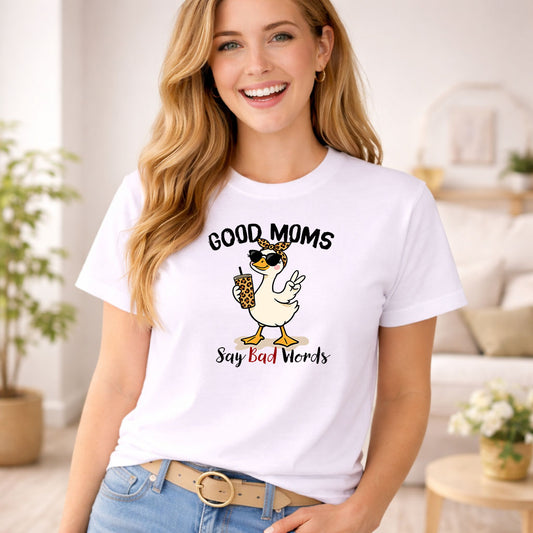 Good Moms Say Bad Words Goose DTF transfer design mockup on a t-shirt featuring a sassy cartoon goose with leopard headband, sunglasses and coffee with Good Moms Say Bad Words lettering