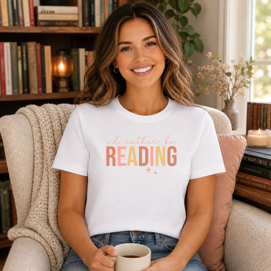 I'd Rather Be Reading Pastel DTF transfer mockup on a t-shirt featuring peach script and bold mixed I'd Rather Be Reading typography