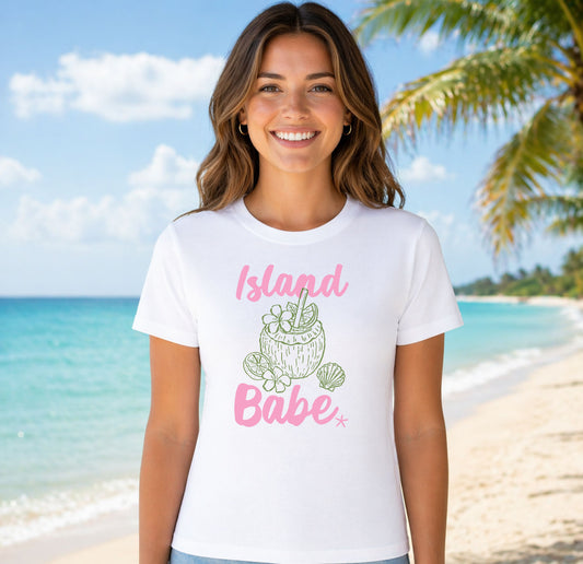 Island Babe Coconut DTF transfer design mockup on a t-shirt featuring an illustrated coconut with straw and pink Babe Island script lettering