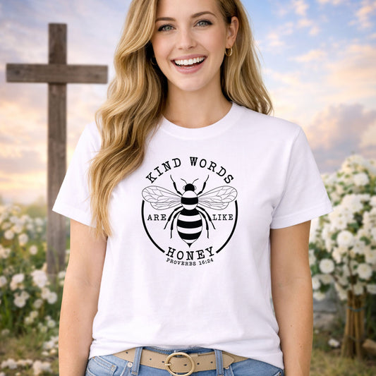 Kind Words Are Like Honey DTF transfer design mockup on a t-shirt featuring a circular emblem with a honeybee and Kind Words Are Like Honey Proverbs 16:24