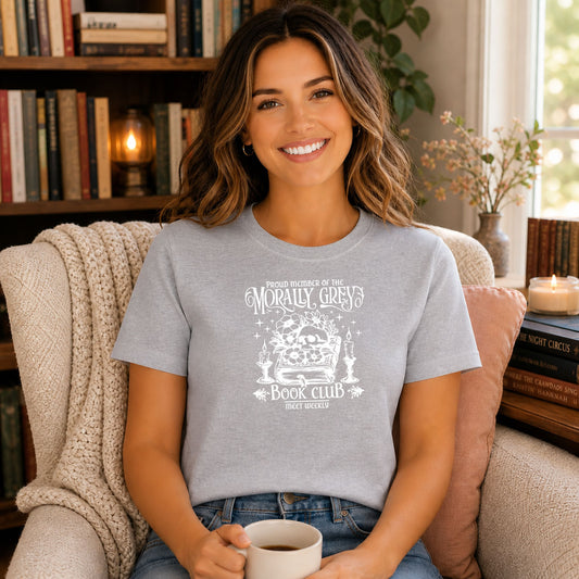 Morally Grey Bookclub DTF transfer mockup on a t-shirt featuring a skull with candles, flowers, and a stack of books