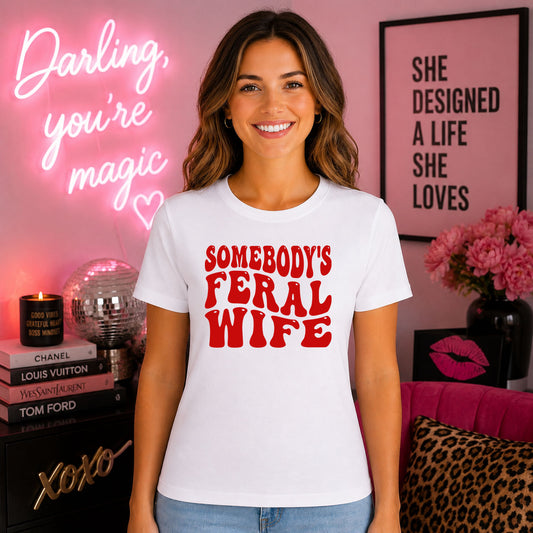 Somebody's Feral Wife Red DTF transfer mockup on a t-shirt featuring bold red retro stacked Somebody's Feral Wife typography