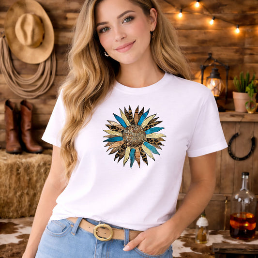 Western Sunflower DTF transfer design mockup on a t-shirt featuring a stylized sunflower with leopard print petals and turquoise feather accents
